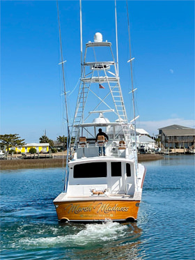 The Marsh Madness returning to port in Atlantic Beach after an offshore fishing charter.